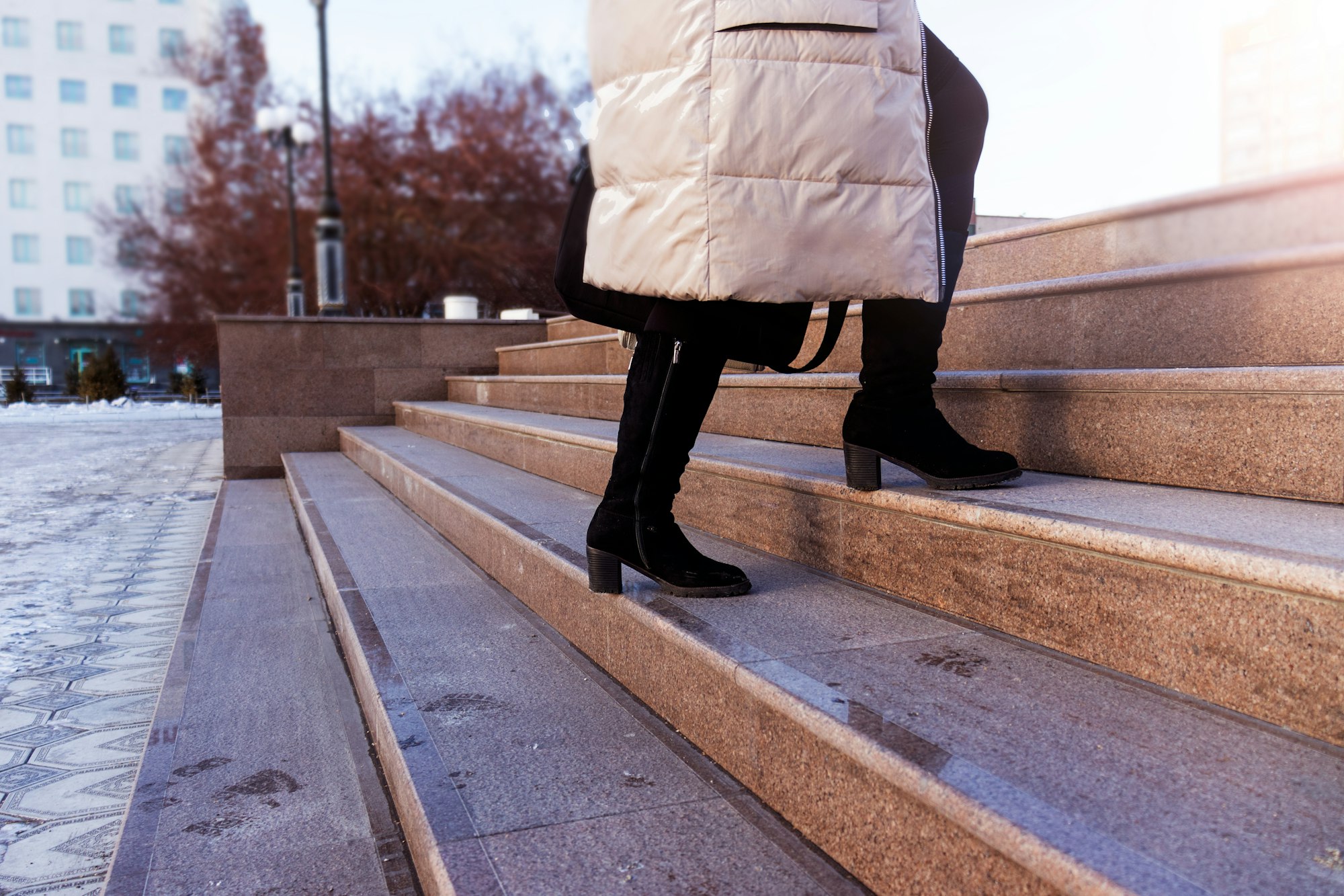 cityscapes marble staircase. women boots with heels