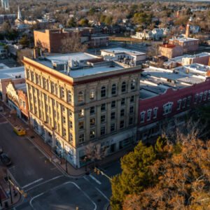 Aerial View of Brick Buildings in New Bern at Sunset in the Downtown Area